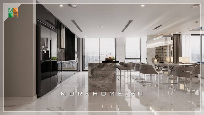 . Phòng ăn của biệt thự được thiết kế theo phong cách hiện đại với bộ bàn ăn độc đáo, bàn đảo bếp và sàn được ốp đá nhân tạo, tạo nên không gian sử dụng bữa ăn sang trọng.